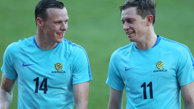 Brad Smith and Craig Goodwin at Socceroos training in Thailand. Picture: Jono Searle.