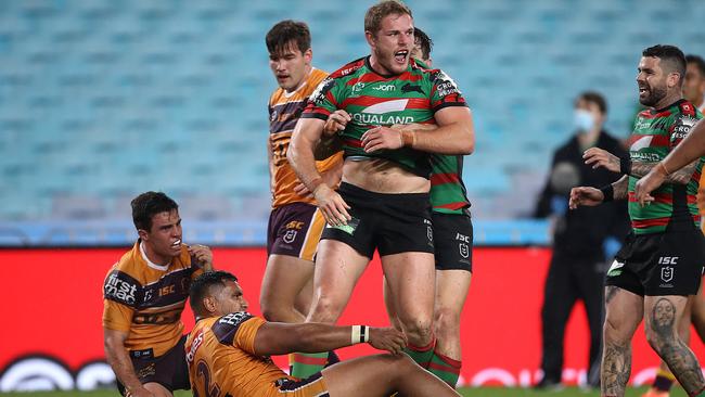 South Sydney’s Tom Burgess celebrates after scoring a try against Brisbane at ANZ Stadium on Friday night. Picture: Getty Images