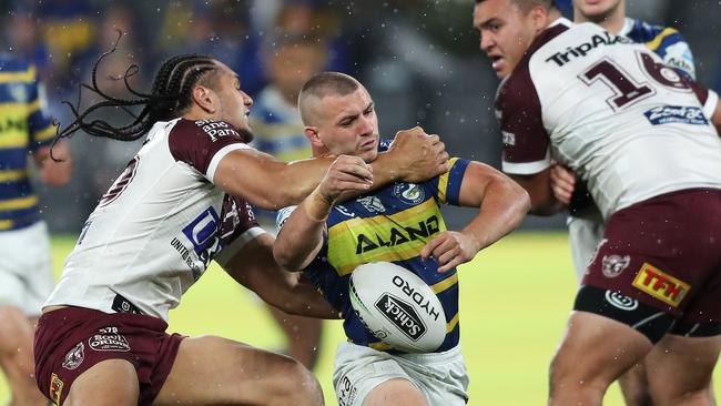 Manly's Martin Taupau hits Parramatta's Raymond Stone high