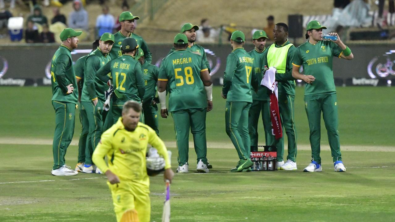 South African players celebrate the dismissal of David Warner. Photo by Sydney Seshibedi/Gallo Images/Getty Images
