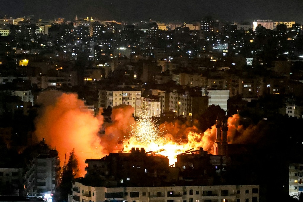 Smoke and fire erupted from the site of one of the strikes in south Beirut