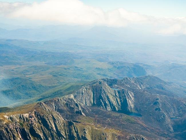 2019 Tasmanian bush fires. Lake Rhona and Denison Range, Gell River Fire - at Southwest National Park. . Picture - LUKE TSCHARKE / PAR AVION