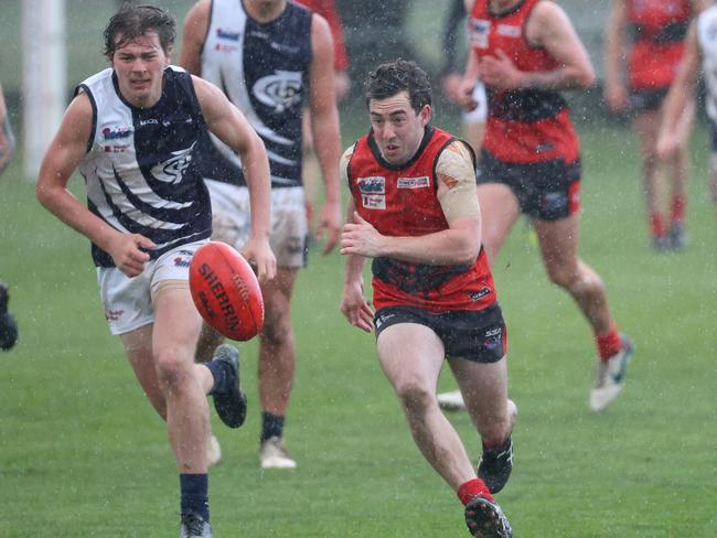 RDFNL: Romsey’s Joel De Haas leads the race to the ball. Picture: Hamish Blair