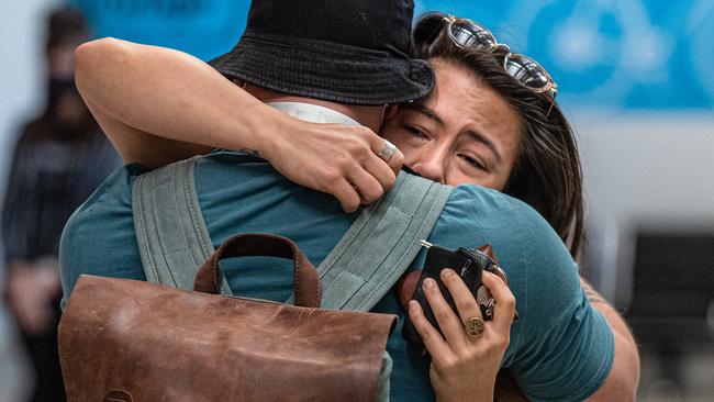 Emotional scenes have played out at Melbourne Airport as the first flight from New Zealand landed. Picture: Jason Edwards