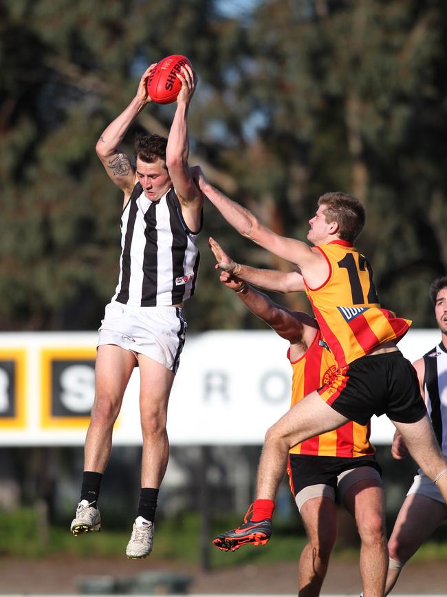 Callan Semple, pictured marking in 2016, was among Reynella’s best on Saturday. Picture: Stephen Laffer