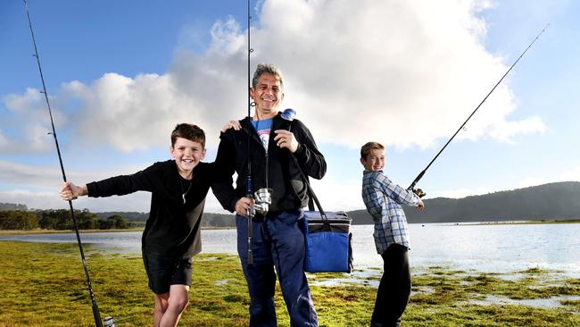 Myponga Reservoir. Chris Fenech with children Luke 10 and Ben 11 at Myponga Reservoir. Picture: Tricia Watkinson