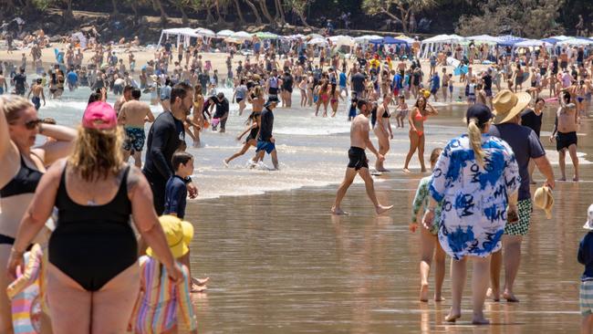 ‘The shamelessness’: Beachgoers parade themselves in front of their fellow beach citizens. Picture Lachie Millard