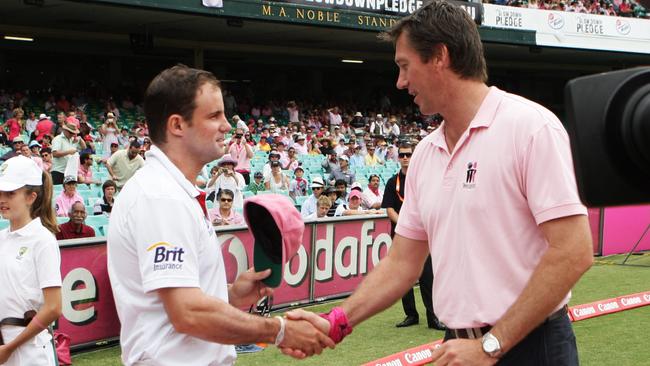 Then-England captain Andrew Strauss presents his pink cap to Glenn McGrath at an SCG Test. Picture: File