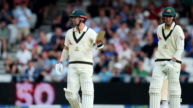 Travis Head of Australia salutes the crowd after reaching his half century. Picture: Getty