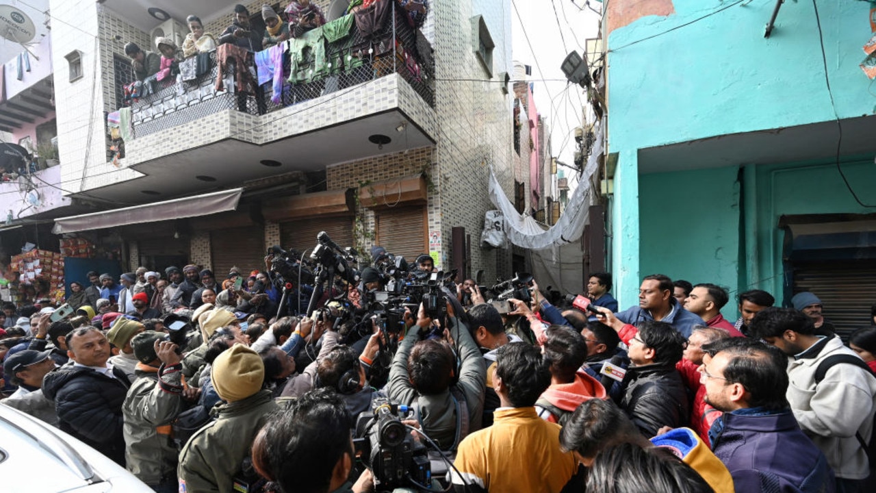 NEW DELHI, INDIA - JANUARY 4: Crowd of people gathered outside the residence of Anjali as Delhi Deputy Chief Minister Manish Sisodia visits to meet the family of Kanjhawala accident victim Anjali Singh at Mangol Puri on January 4, 2023 in New Delhi, India. A 20-year-old girl was killed when her scooty was allegedly hit by a car and dragged for 12 kilometres in the national capital on Sunday. Her body was found in outer Delhi's Kanjhawala. (Photo by Sanchit Khanna/Hindustan Times via Getty Images)