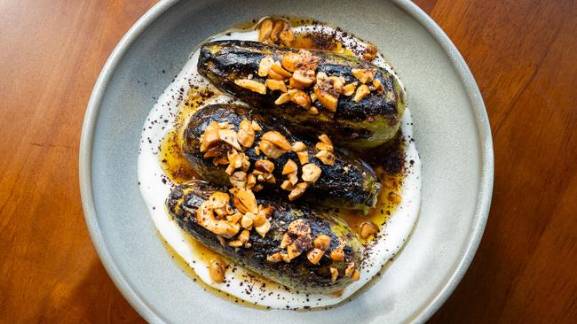 BBQ green zucchinis on a bed of burnt butter and yoghurt. Picture: Jake Nowakowski