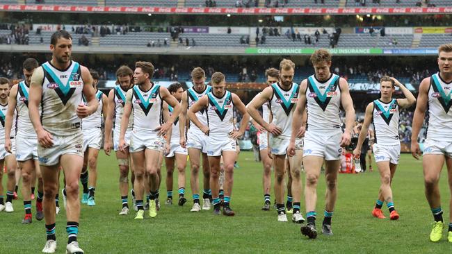 Travis Boak leads Port Adelaide off after the loss. Picture: Alex Coppel