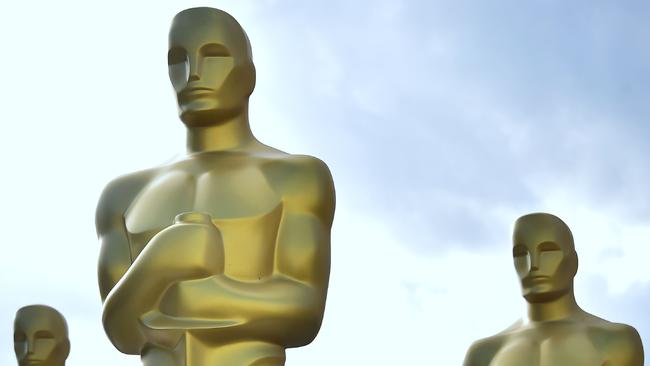 (FILES) In this file photo taken on February 22, 2017 Oscar statues stand at a Hollywood back lot.  With the Oscars just days away, industry figures have tried to strike a reflective, humble tone in light of a glut of recent controversies that have dogged Hollywood. From the #OscarsSoWhite row of 2016 to the Weinstein sexual misconduct scandal currently engulfing the business, the Academy of Motion Picture Arts and Sciences is acutely aware of the need to project a more wholesome image.  / AFP PHOTO / FREDERIC J. BROWN / TO GO WITH AFP STORY by Frankie TAGGART, 