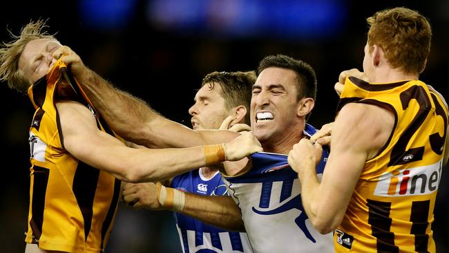 A younger James Sicily goes head to head with the Kangaroos. Picture: Wayne Ludbey