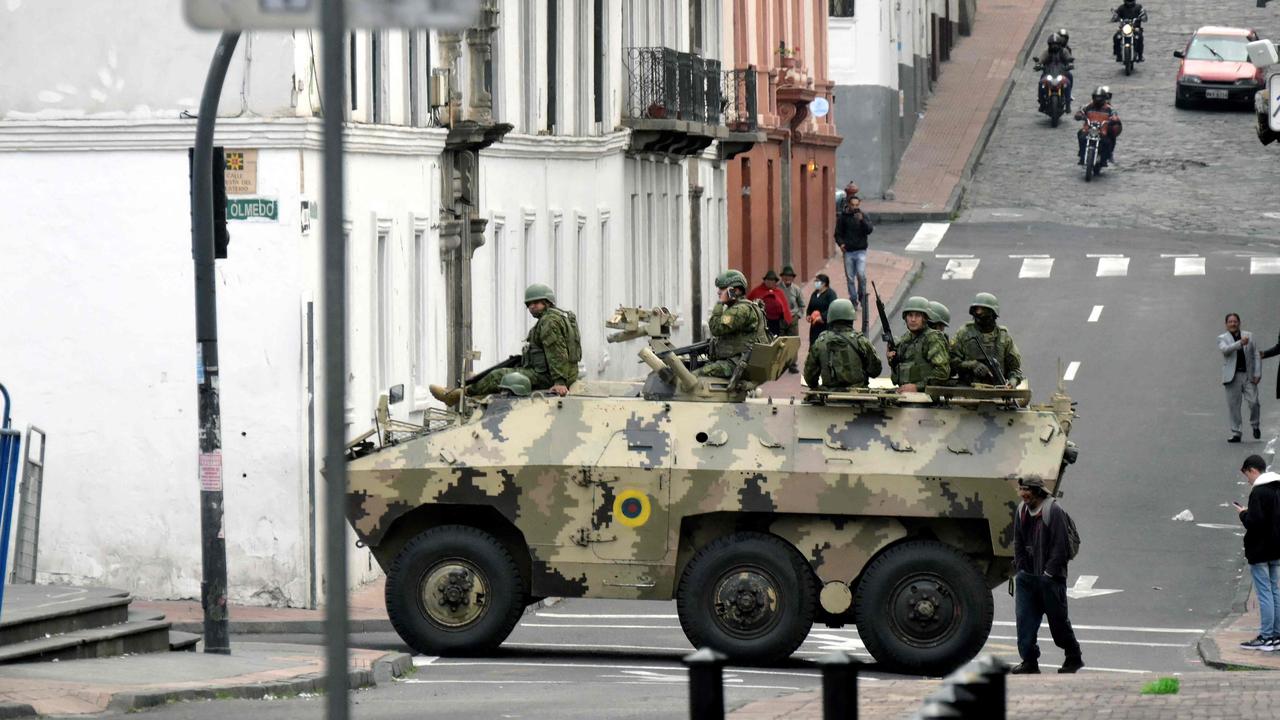 Ecuadorean security forces patrol the area around the main square and presidential palace. Picture: Rodrigo Buendia/AFP