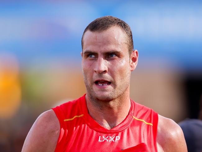 GOLD COAST, AUSTRALIA - MARCH 09: Jarrod Witts of the Suns looks on at the quarter time break during the 2024 AFL Opening Round match between the Gold Coast SUNS and the Richmond Tigers at People First Stadium on March 09, 2024 in Gold Coast, Australia. (Photo by Dylan Burns/AFL Photos via Getty Images)