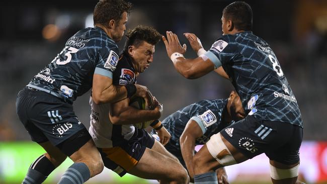 The Brumbies’ Tom Banks is tackled. Picture: AAP