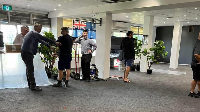 Volunteers pitch in to help prepare the Camden Sports Club "Sporties" as parts of Camden are ordered to evacuate on April 7. Picture: Supplied