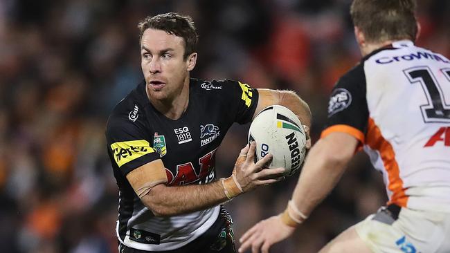 <a capiid="aa130b13f87d5753a3ab7a468adf891b" class="capi-video">Crichton bombs amazing try</a>                     Penrith's James Maloney during NRL match between the Penrith Panthers and Wests Tigers at Penrith Stadium. Picture. Phil Hillyard