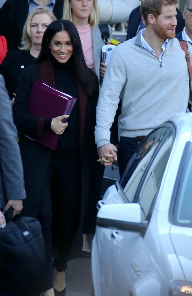 Speculation... Meghan’s mystery purple folders. Picture John Grainger