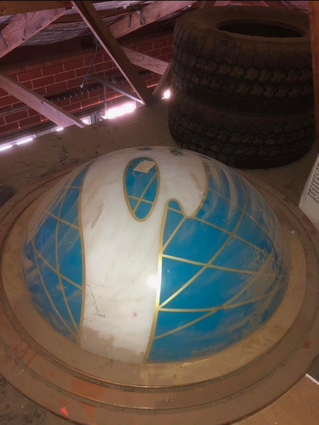 This is how Emily Dowd's husband found The Planet nightclub sign, in the attic of a client's home. Picture: Emily Dowd