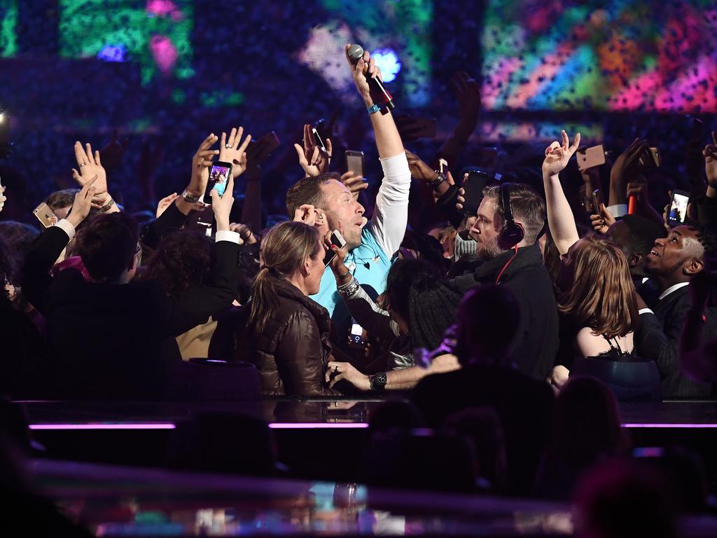 Chris Martin of Coldplay performs with The Chainsmokers on stage at The BRIT Awards 2017 at The O2 Arena on February 22, 2017 in London, England. Picture: Getty