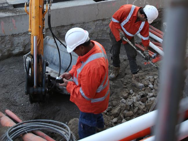 Light rail workers on site today. Picture: John Grainger