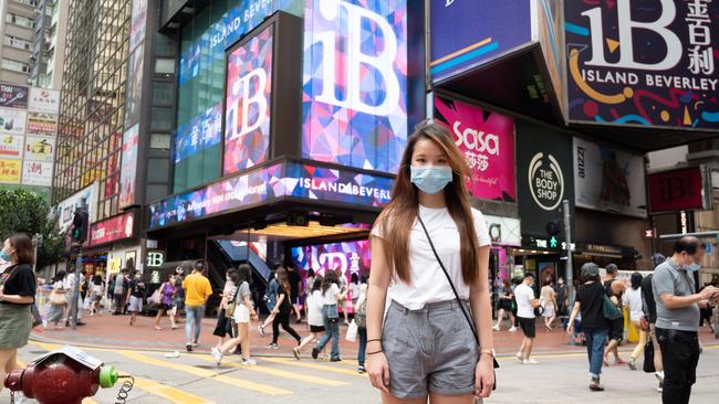 Student ‘Liz’, in downtown Hong Kong, has been studying at the ANU in Canberra and, following Scott Morrison’s protection visa announcement, would like to return to Australian.