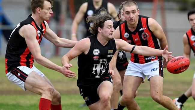 James Batty, in action earlier this season during Port District’s clash with Rostrevor Old Collegians, was best in the Magpies’ draw with Henley. Picture: AAP/Mark Brake