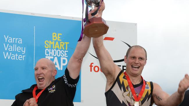 Norwood coach Denis Knight and captain John Holmes celebrates the premiership win. Picture: Chris Eastman