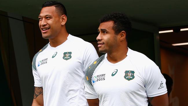 Israel Folau and Will Genia at the World Cup in 2015. Picture: Stu Forster/Getty Images