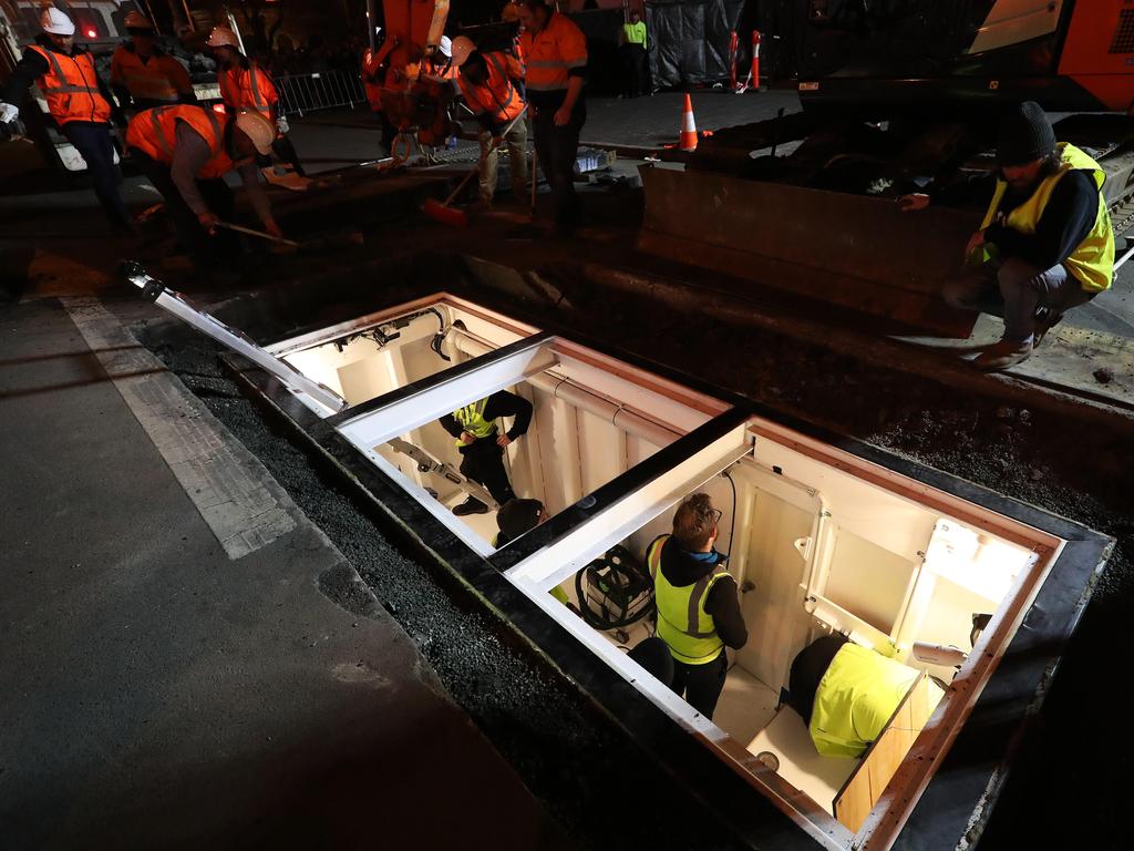 Dark Mofo 2018. Last minute adjustments in the chamber. Performance artist Mike Parr enters the chamber he will live in for 72 hours under Macquarie Street Hobart. Picture: NIKKI DAVIS-JONES