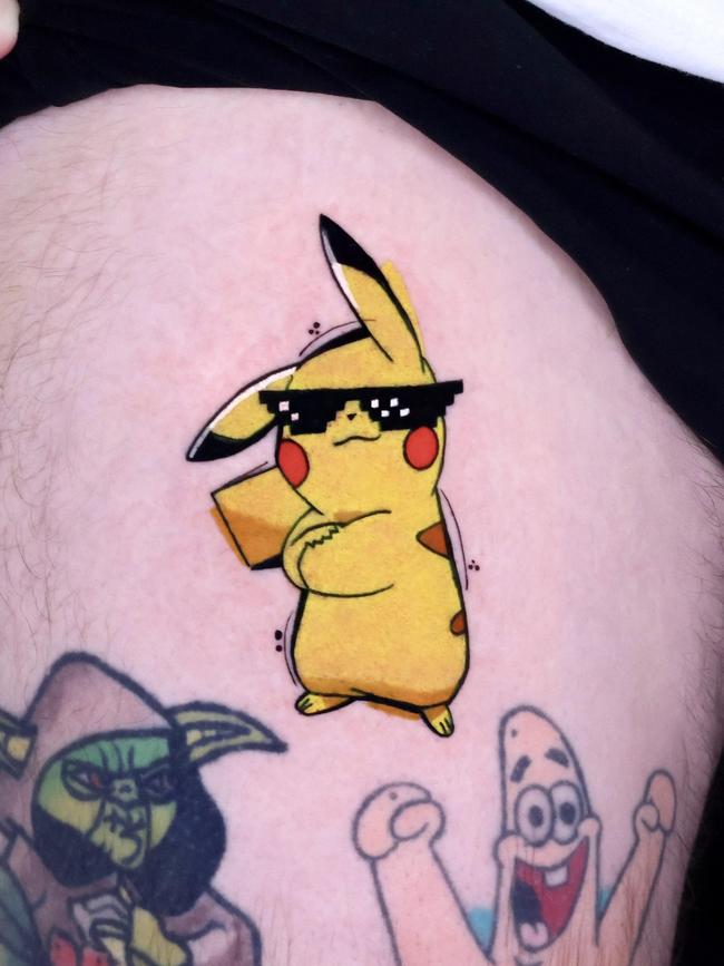 Yudi’s favourite tattoo, Pikachu with pixel sunglasses.