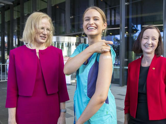 Chief Health Officer Jeannette Young, Queensland's first vaccine recipient Zoe Park and Health Minister Yvette D'Ath. Picture: Glenn Hunt/Getty Images