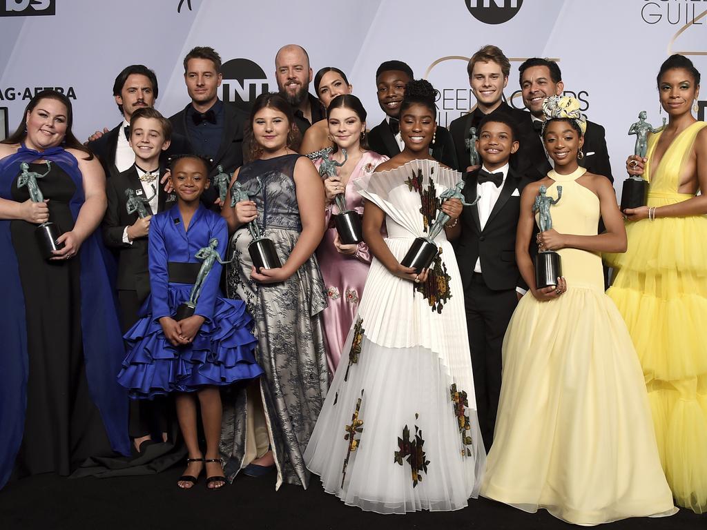 The cast of This Is Us, winners of the award for outstanding performance by an ensemble in a drama series, poses in the press room. Picture: AP