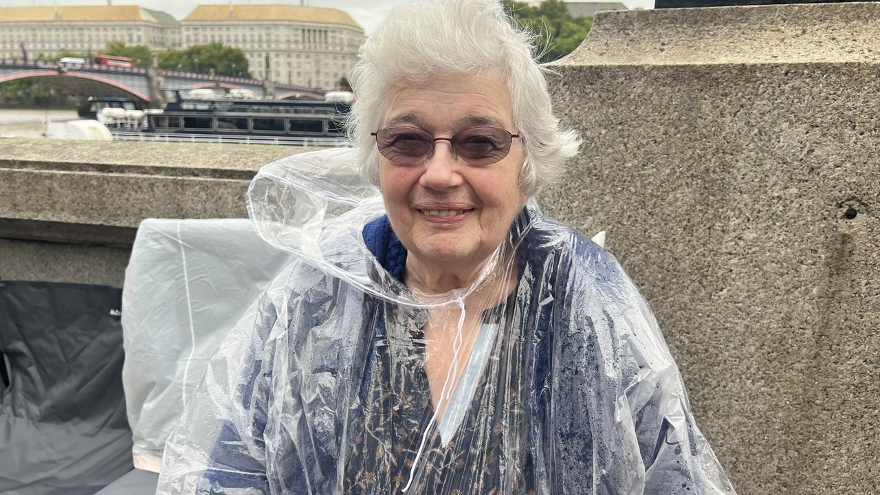 Armed with a thin rain poncho, Patricia King, 69, also queued overnight to view the Queen’s coffin. Picture: Chantelle Francis