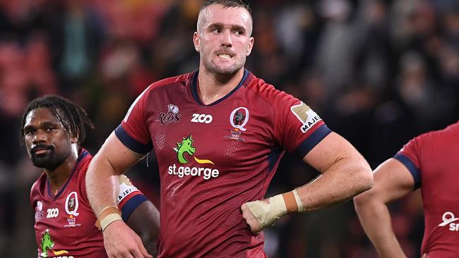 Izack Rodda of the Reds (right) reacts following the Round 15 Super Rugby match between the Queensland Reds and the Highlanders at Suncorp Stadium in Brisbane, Saturday, May 26, 2018. (AAP Image/Dave Hunt) NO ARCHIVING, EDITORIAL USE ONLY