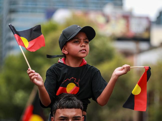 Demonstrators march towards Victoria Park during an Invasion Day protest in Sydney, Australia. Picture: Getty Images