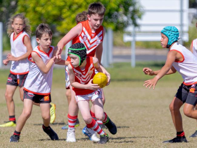 JUNIOR FOOTY: In the AFL U11 R4 at Cavanbah Oval, Byron Bay, the  Lismore vs. Burleigh game saw the Swans go down by 115 to 1-0-6 to 18-8-116. Photo: Daniel Cohen