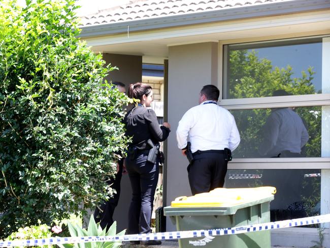 Police at the Burpengary house yesterday. Picture: Steve Pohlner