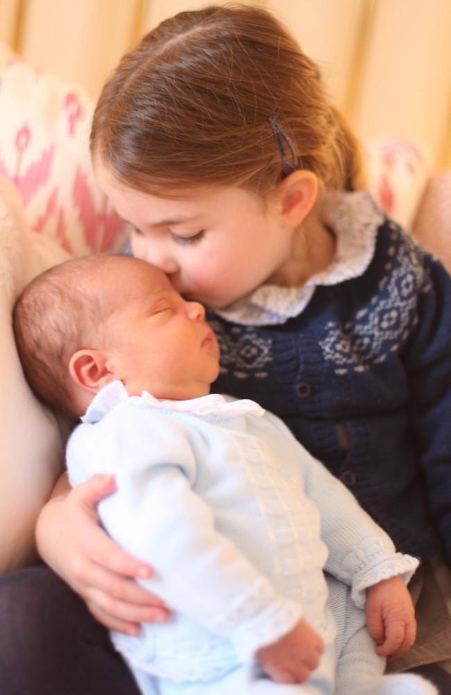 Big sister Princess Charlotte cuddles up to her new baby brother. Picture: Duchess of Cambridge/Kensington Palace/AFP