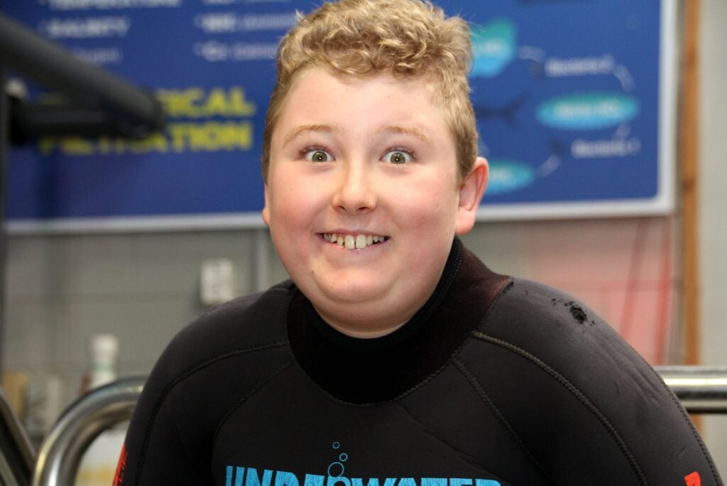 Colby Speare recently spent 506 consecutive days in hospital fighting leukemia. He missed birthdays and Christmas. His parents along with Merlin's Magic Wand have given him a birthday surprise of swimming with the sharks at Sea Life Mooloolaba. Nearly there! Colby getting very excited about swimming with the sharks Photo: Pete Evans / Sunshine Coast Daily. Picture: Pete Evans