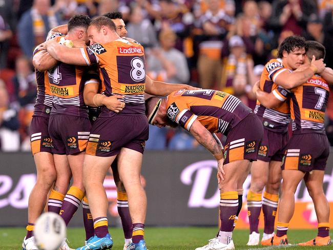 BRISBANE, AUSTRALIA - JULY 26: The Broncos players celebrate their victory after the round 20 NRL match between the Brisbane Broncos and the Cronulla Sharks at Suncorp Stadium on July 26, 2018 in Brisbane, Australia.  (Photo by Bradley Kanaris/Getty Images)