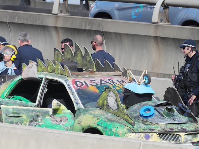 Police patrol the exhibition building and teams build security fences ahead of Land Forces the 2024 International Land Defence Exposition to be held in Melbourne. Protesters block the exit off the freeway at Montague st. Saturday, September 7. 2024. Picture: David Crosling