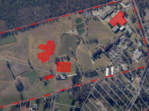 Aerial view of site showing proposed alterations shaded in red. A film studio, office building and a replica Biblical site are proposed at 12-14 Zouch Rd, Denham Court. Picture: Planning documents