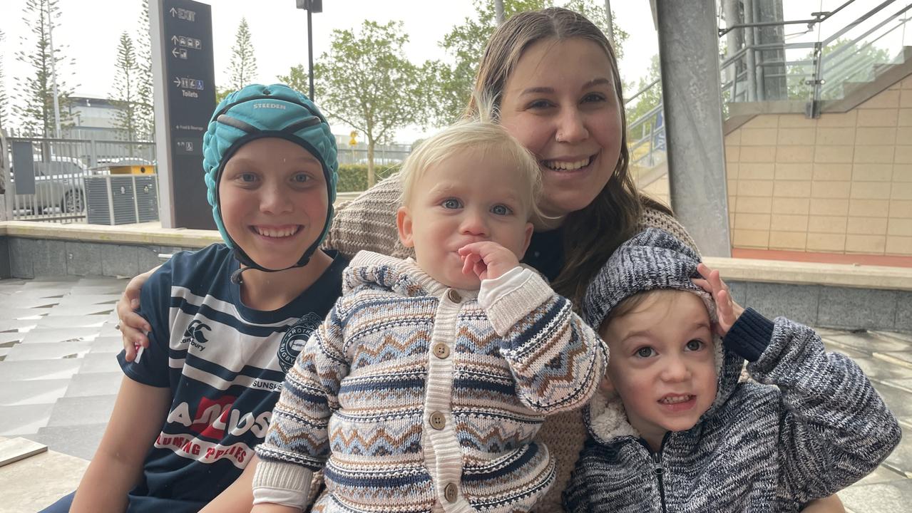 Israel and Dakota Presland with Levi (front, on lap) and Micah Gerring.