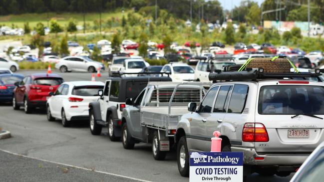 People wait in line for a Covid-19 test at Southport on Wednesday. Picture: Chris Hyde/Getty Images