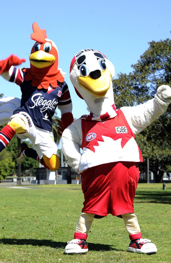 Cyggy, the Sydney Swans mascot (right) and Rocky, the Sydney Roosters mascot. Picture: Craig Wilson