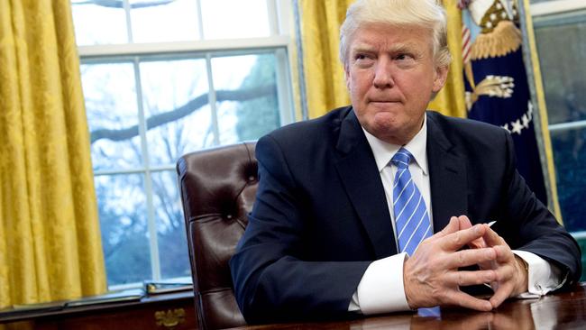 US President Donald Trump signed a series of executive orders on Monday, including withdrawing the US from the Trans-Pacific Partnership trade deal. Picture: AFP Photo / Saul Loeb