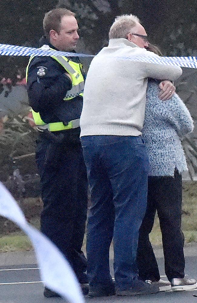 The parents of Matt Goland embrace after their son was killed in a horror smash on Saturday morning. Picture: Nicole Garmston